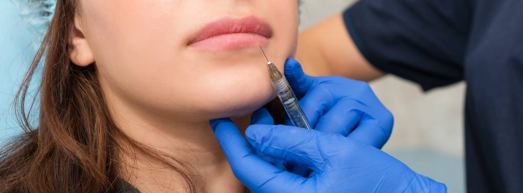 cosmetologist-makes-lip-augmentation-procedure