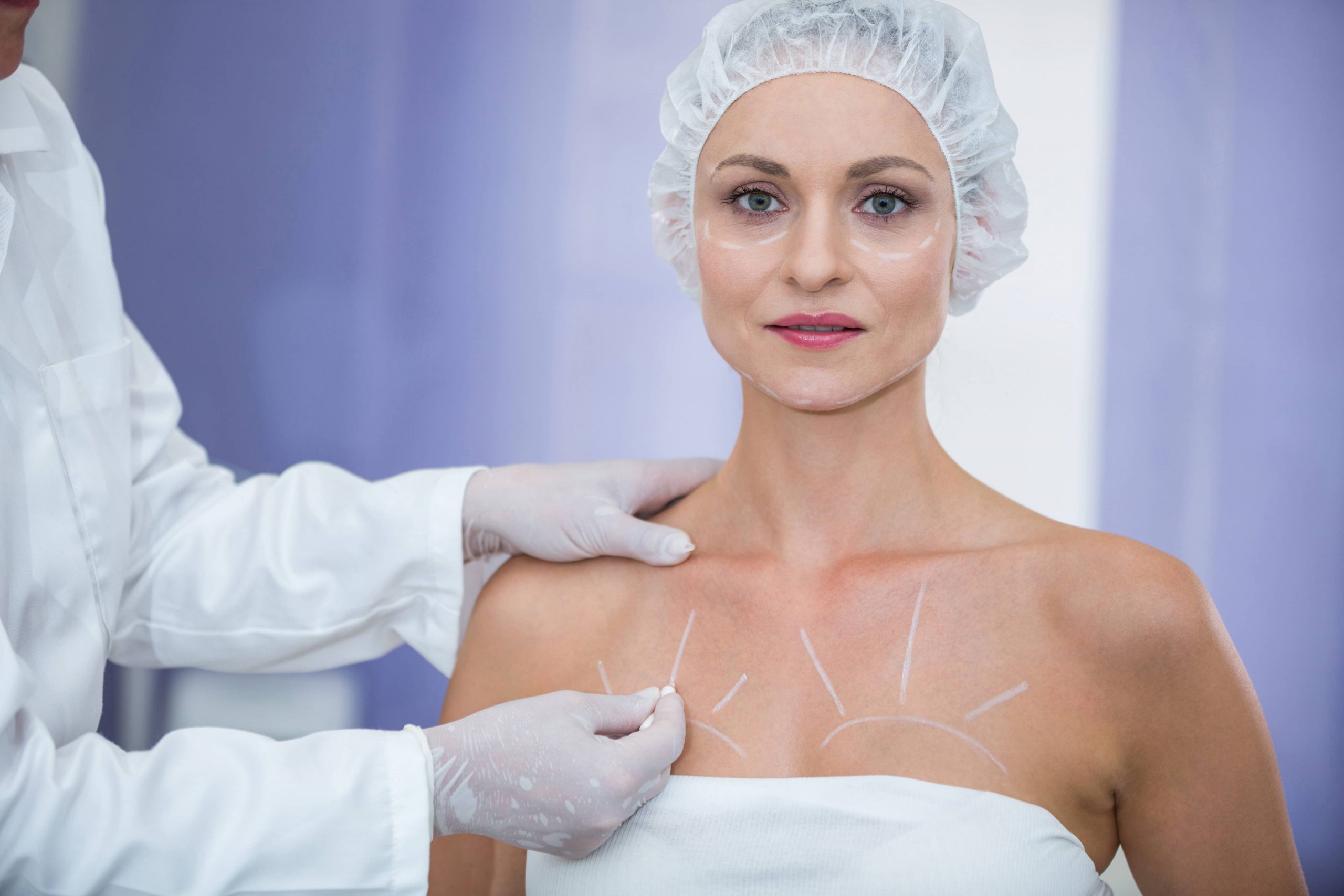 doctor-marking-female-patients-body-breast-surgery